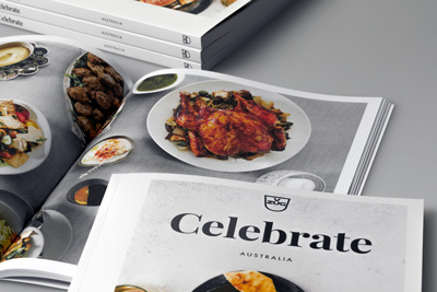 Photograph of the publication design and food styling in a large double-page image.