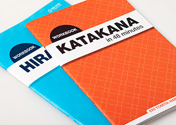 Photograph of two student workbooks – Nelson Hiragana/Katakana in 48 minutes typeset for Cengage Learning Australia. 